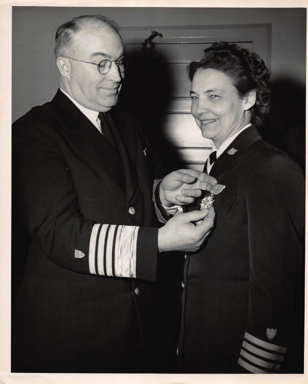 Capt. Stratton receives the Legion of Merit Medal from Admiral Joseph Farley, postwar Commandant of the Coast Guard at Coast Guard Headquarters. (U.S. Coast Guard) Capt. Stratton receives the Legion of Merit Medal from Admiral Joseph Farley, postwar Commandant of the Coast Guard at Coast Guard Headquarters. (U.S. Coast Guard)